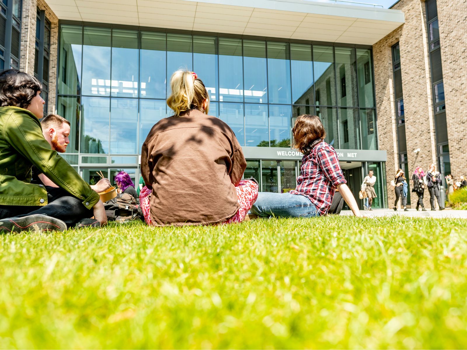 Students sat outside on Pelham courtyard